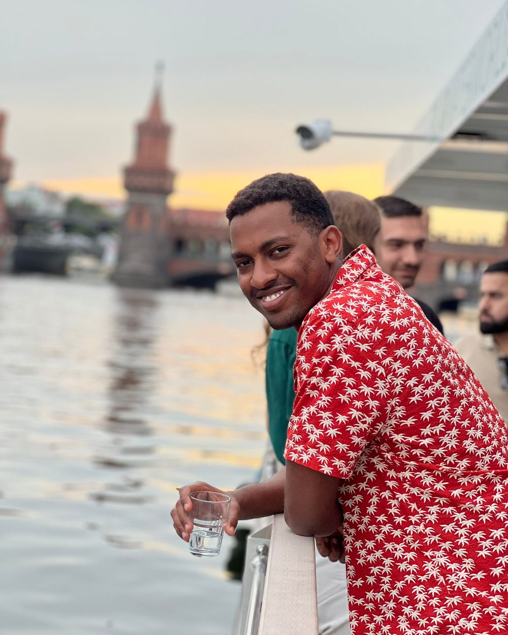 A founder on the Spree at sunset during Berlin accelerator week